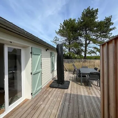 Maison Face A La